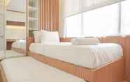 Bilik Tidur 2 Comfy and Modern 3BR at Transpark Cibubur Apartment By Travelio