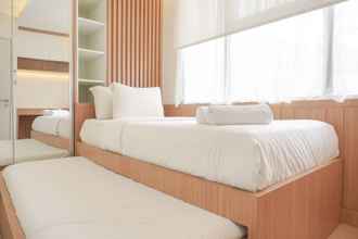 Bedroom 4 Comfy and Modern 3BR at Transpark Cibubur Apartment By Travelio