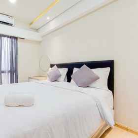 Bedroom 1 Comfy and Well Designed 2BR Sky House BSD Apartment By Travelio, BSD Hotels