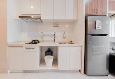 公共空間 5 Comfy and Well Designed 2BR Sky House BSD Apartment By Travelio