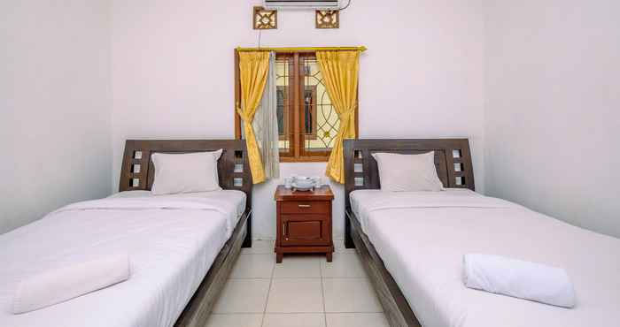 Bedroom Comfy and Big Studio at Graha Wishnu Guest House By Travelio