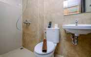 In-room Bathroom 4 Comfort Living and Minimalist Studio at Transpark Cibubur Apartment By Travelio