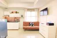 Common Space Modern and Comfy 2BR Apartment at Parahyangan Residence By Travelio