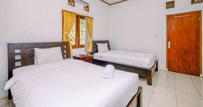 Kamar Tidur Simply and Homey Studio at Graha Wishnu Guest House By Travelio