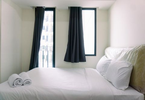 Bedroom Elegant and Nice Studio at Osaka Riverview PIK 2 Apartment By Travelio