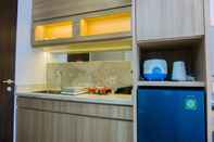 Ruang untuk Umum Warm and Minimalist Studio at Transpark Bintaro Apartment By Travelio