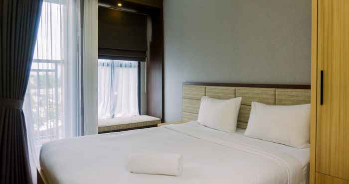 Bedroom Warm and Minimalist Studio at Transpark Bintaro Apartment By Travelio