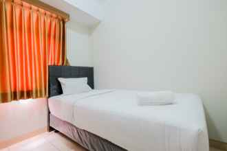 Kamar Tidur 4 Comfortable and Homey 2BR Springlake Summarecon Apartment By Travelio