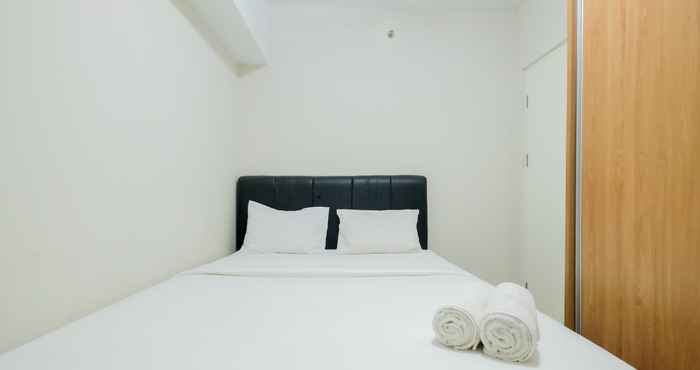 Kamar Tidur Comfortable and Homey 2BR Springlake Summarecon Apartment By Travelio