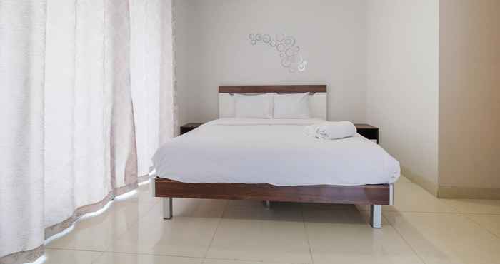 Bedroom 2BR Apartment at The Mansion near JIEXPO Kemayoran By Travelio