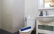 In-room Bathroom 7 Nice 2BR at Maqna Residence Apartment By Travelio