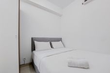 Bedroom Luxurious 2BR Apartment at Serpong Garden By Travelio