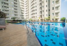 Swimming Pool 6 Best Choice 1BR at Parahyangan Residence Apartment By Travelio