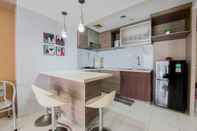 Common Space Simply Look and Comfort 2BR at Great Western Apartment By Travelio