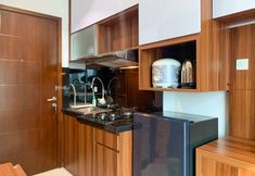 Common Space 4 Comfort and Modern Studio Apartment at Capitol Park Residence By Travelio