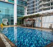 Swimming Pool 6 Comfort and Modern Look Studio at Ambassade Kuningan Apartment By Travelio