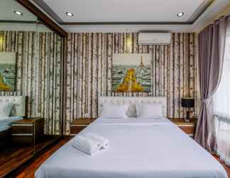 Bedroom 2 Comfort and Modern Look Studio at Ambassade Kuningan Apartment By Travelio