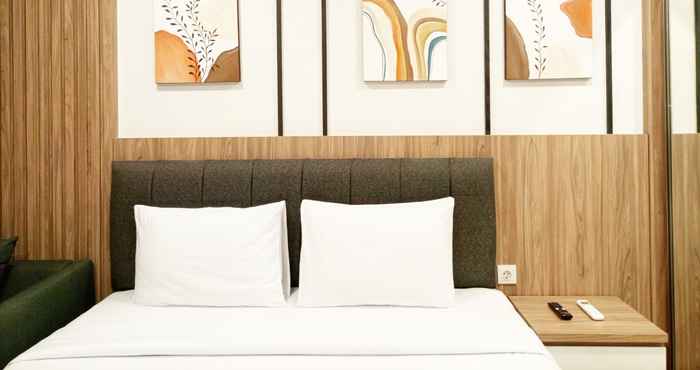 Kamar Tidur Comfort and Simply Look Studio Room Apartment at Mataram City By Travelio