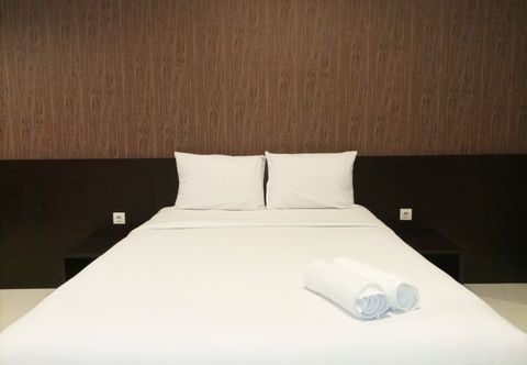 Kamar Tidur Luxurious Studio Apartment at Mataram City By Travelio