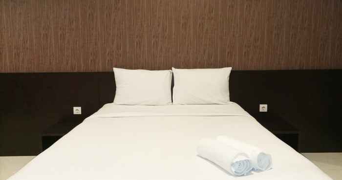 Kamar Tidur Luxurious Studio Apartment at Mataram City By Travelio