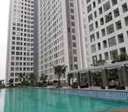 Swimming Pool 7 Good Deal and Comfy 2BR at M-Town Residence Apartment By Travelio