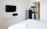 Bedroom 4 Cozy and Modern Stay Studio at Puncak Permai Apartment By Travelio