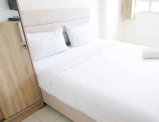 Bedroom 2 Cozy and Modern Stay Studio at Puncak Permai Apartment By Travelio