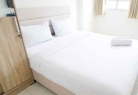 Bedroom Cozy and Modern Stay Studio at Puncak Permai Apartment By Travelio