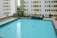 Lobi Homey and Comfy 2BR at Puncak Permai Apartment By Travelio