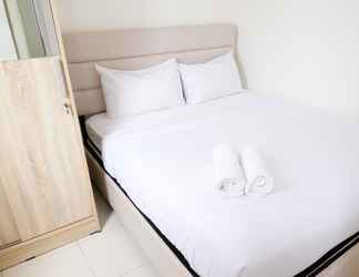 Bedroom 2 Best Choice and Good View 2BR at Puncak Permai Apartment By Travelio