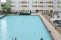 Swimming Pool Best Choice and Good View 2BR at Puncak Permai Apartment By Travelio