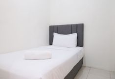 Bedroom 2 Best Choice and Good View 2BR at Puncak Permai Apartment By Travelio