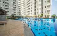 Swimming Pool 5 Clean and Cozy 1BR Apartment at Parahyangan Residence By Travelio