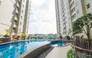 Swimming Pool 6 Clean and Cozy 1BR Apartment at Parahyangan Residence By Travelio