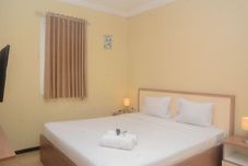 Bedroom Comfort and Nice 2BR at Grand Palace Kemayoran Apartment By Travelio