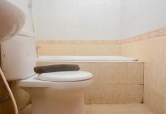 In-room Bathroom 6 Comfort and Nice 2BR at Grand Palace Kemayoran Apartment By Travelio