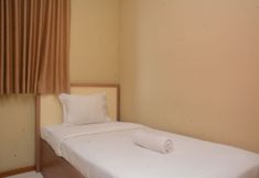 Bedroom 2 Comfort and Nice 2BR at Grand Palace Kemayoran Apartment By Travelio
