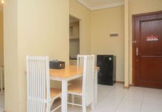 Common Space 4 Comfort and Nice 2BR at Grand Palace Kemayoran Apartment By Travelio