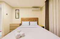 Bilik Tidur Nice and New 2BR at Marquis De Lafayette Apartment By Travelio
