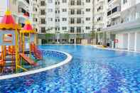 Swimming Pool Cozy and Warm Studio at 8th Floor Signature Park Grande Apartment By Travelio