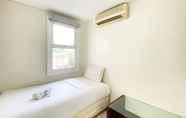 Kamar Tidur 3 Pleasant and Restful 2BR at Apartment at Parahyangan Residence By Travelio