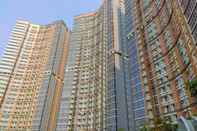 Bangunan Comfort and Fancy 1BR at Gold Coast Apartment By Travelio