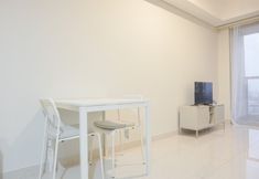 Bedroom 2 Comfort and Fancy 1BR at Gold Coast Apartment By Travelio