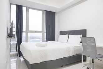 Bedroom 4 Comfort and Fancy 1BR at Gold Coast Apartment By Travelio