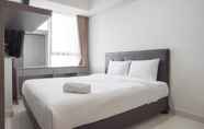 Bedroom 2 Comfort and Pleasant 2BR at Gold Coast Apartment By Travelio