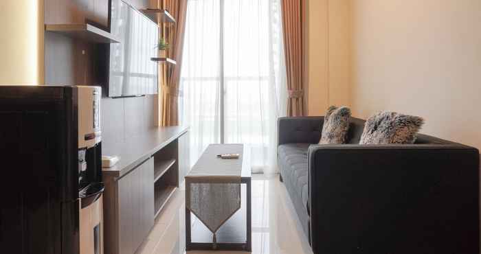 Common Space Comfort and Pleasant 2BR at Gold Coast Apartment By Travelio