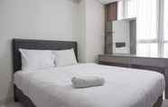 Kamar Tidur 4 Comfort and Pleasant 2BR at Gold Coast Apartment By Travelio