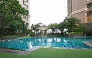 Swimming Pool 2 Warm and Comfort 2BR at Marina Ancol Apartment By Travelio