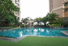 Swimming Pool 2 Warm and Comfort 2BR at Marina Ancol Apartment By Travelio