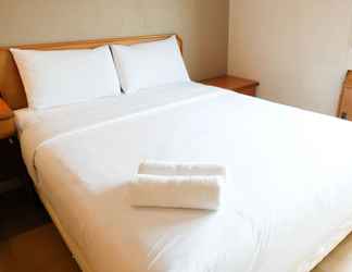 Bedroom 2 Homey and Extra Spacious 2BR at Kondominium Puncak Marina Apartment By Travelio